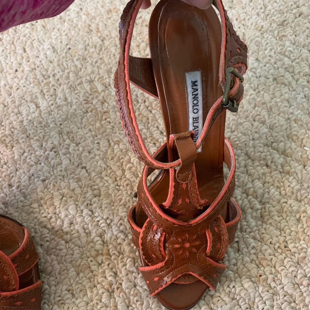 Brownish tan leather with coral design trim! One of a kind